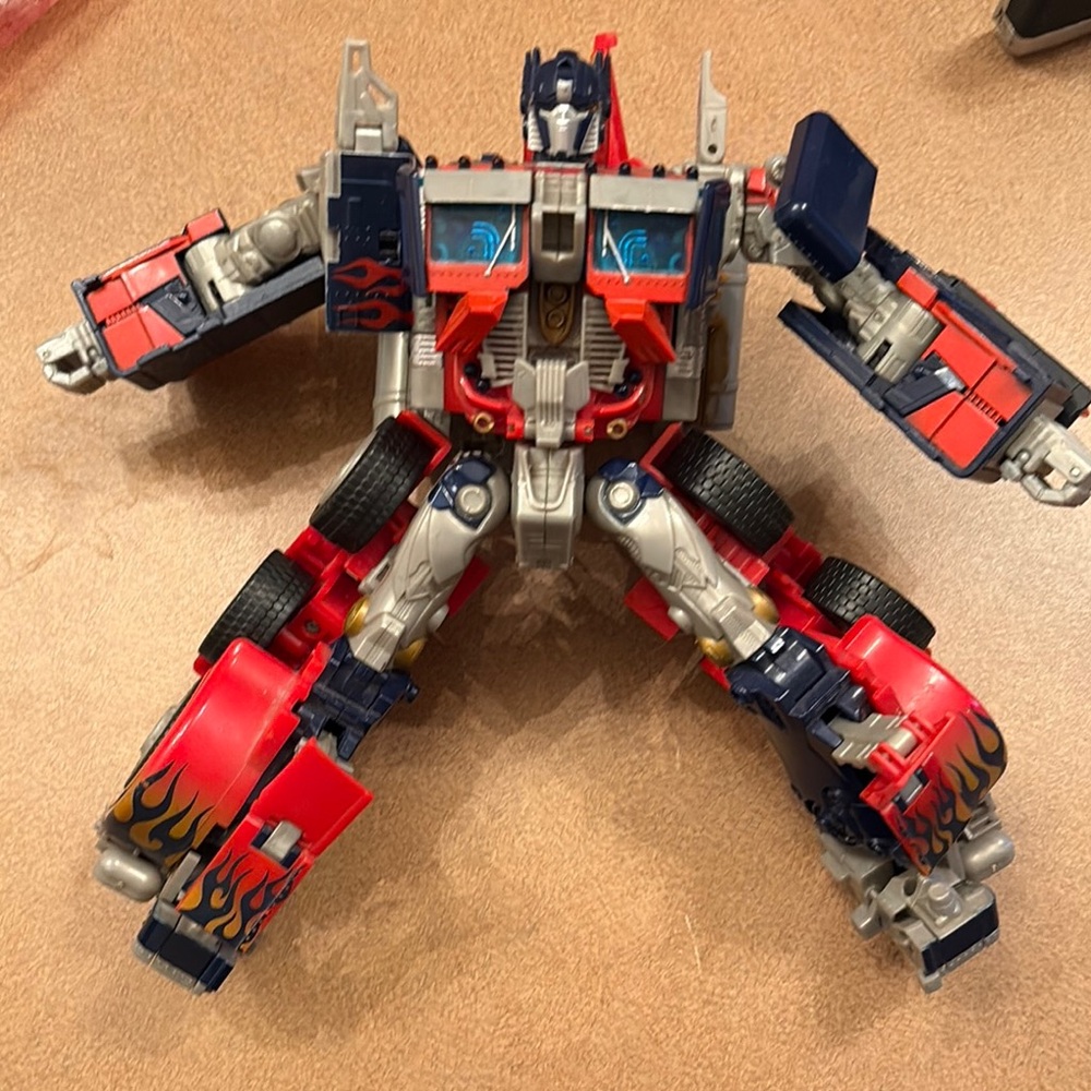 Hasbro Transforming Robot Action Figure - Red and Blue